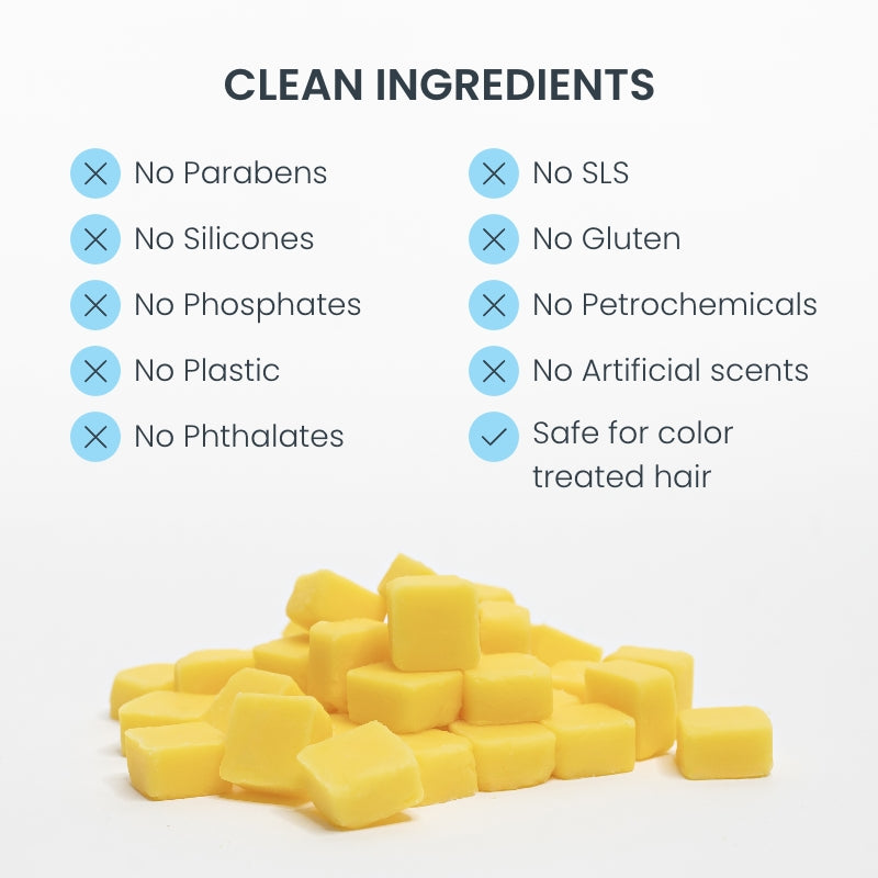 Pile of eco-friendly conditioner tablets with list of clean ingredients that are paraben-free, phosphate-free, silicone-free