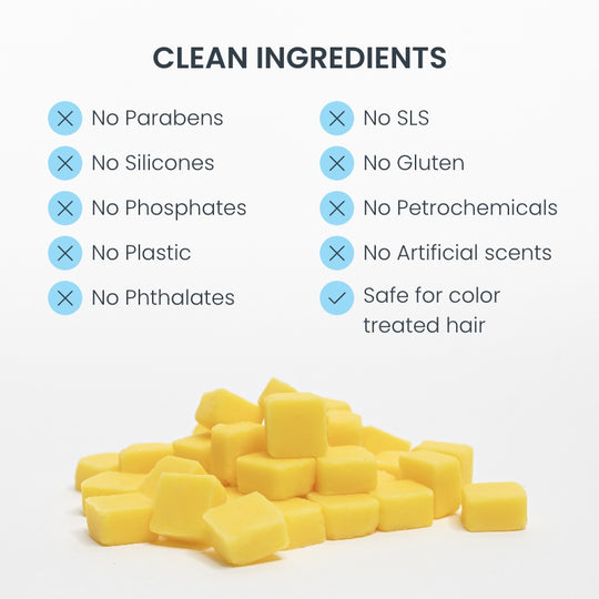 Pile of eco-friendly conditioner tablets with list of clean ingredients that are paraben-free, phosphate-free, silicone-free