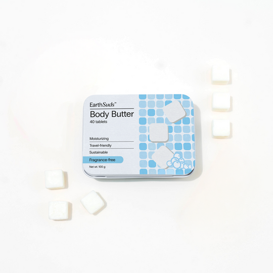 EarthSuds Body Butter tablets in a reusable pack. Travel-friendly, biodegradable, plastic-free.