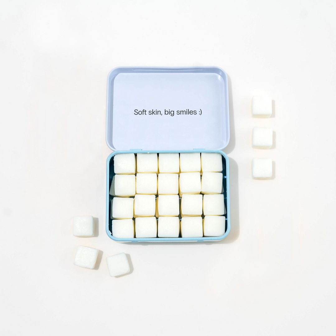 EarthSuds Body Butter tablets in a reusable pack. Travel-friendly, biodegradable, plastic-free.