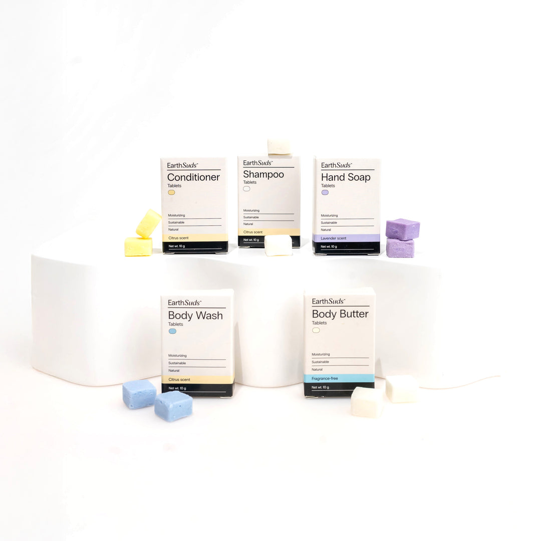 EarthSuds travel packs including shampoo, conditioner, body wash, hand soap, and body butter.