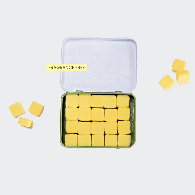 Travel conditioner with yellow tablets in a reusable case that's plastic-free and sustainable.