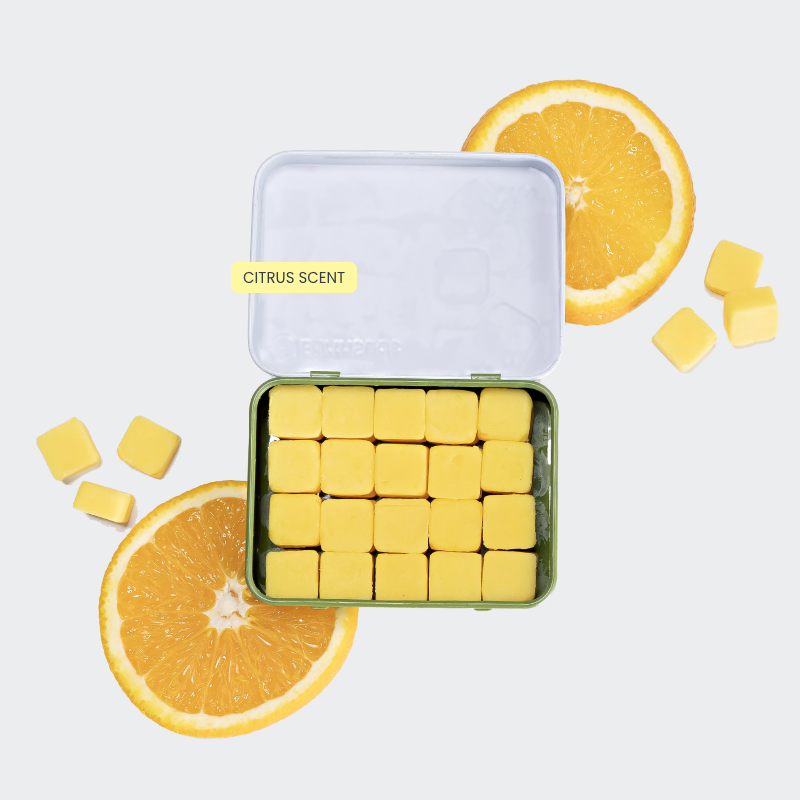 Refillable, plastic-free, travel-friendly tin of biodegradable conditioner tablets with citrus scent