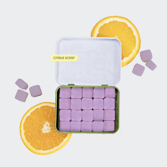 Refillable, plastic-free, travel-friendly tin of biodegradable hand soap tablets with citrus scent