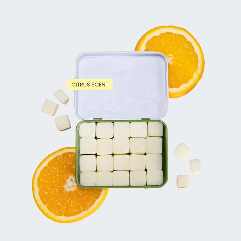 Refillable, plastic-free, travel-friendly tin of biodegradable shampoo tablets with citrus scent